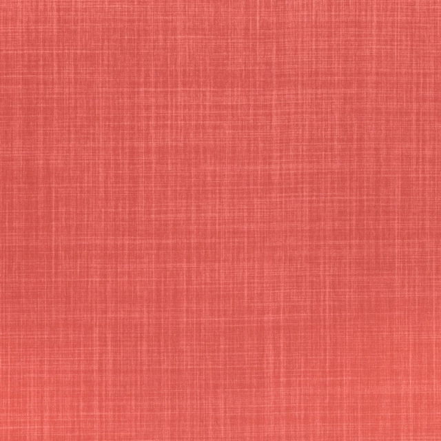 Warm coral-red Dune Gingersnap with a subtle crosshatched woven texture