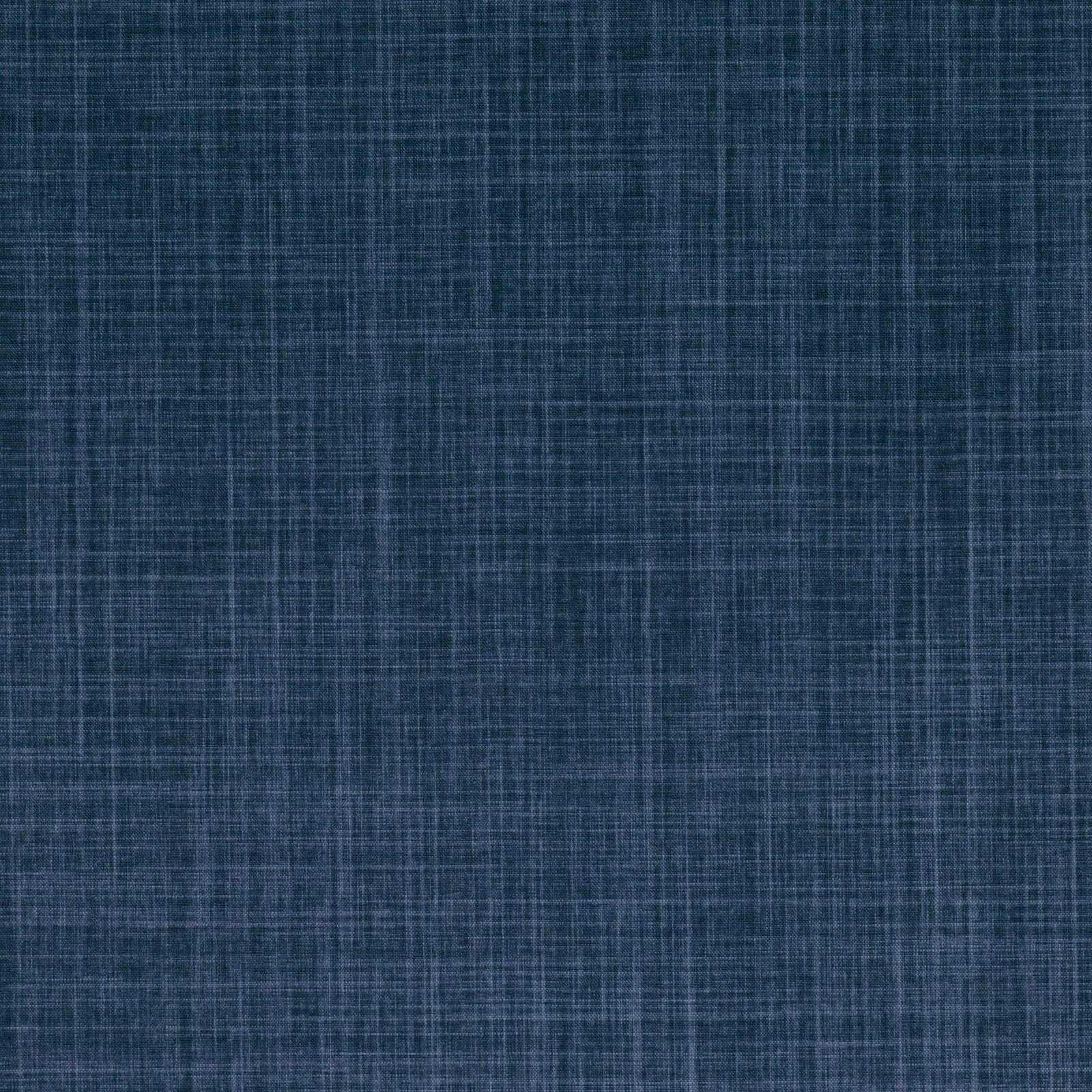 Deep indigo blue fabric with fine crosshatched weave and softly weathered texture