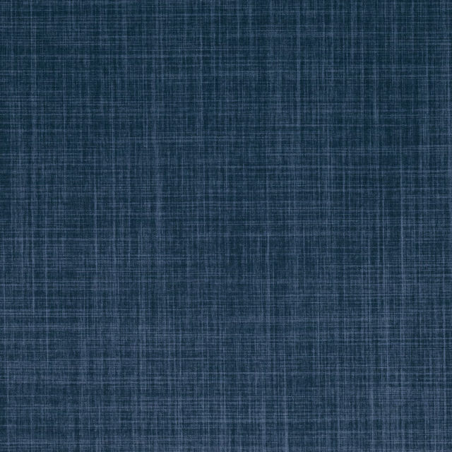 Deep indigo blue fabric with fine crosshatched weave and softly weathered texture