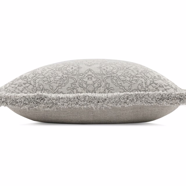 Pale grey damask cushion fabric with a nubby edge and plain woven underside