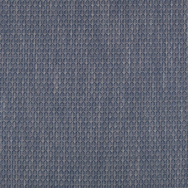 Deep indigo woven fabric with fine pale leaf motifs arranged in vertical rows