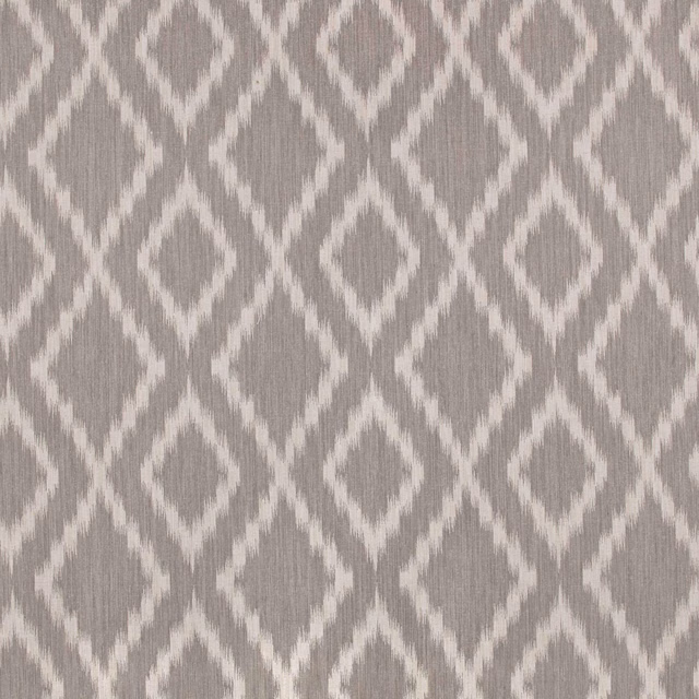 Taupe-grey woven fabric with repeating softly edged ivory diamond motifs