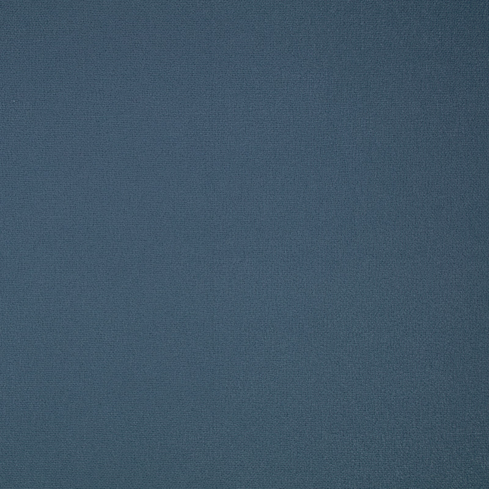 Close-up of finely woven matte indigo-blue Elio fabric with subtle tonal depth
