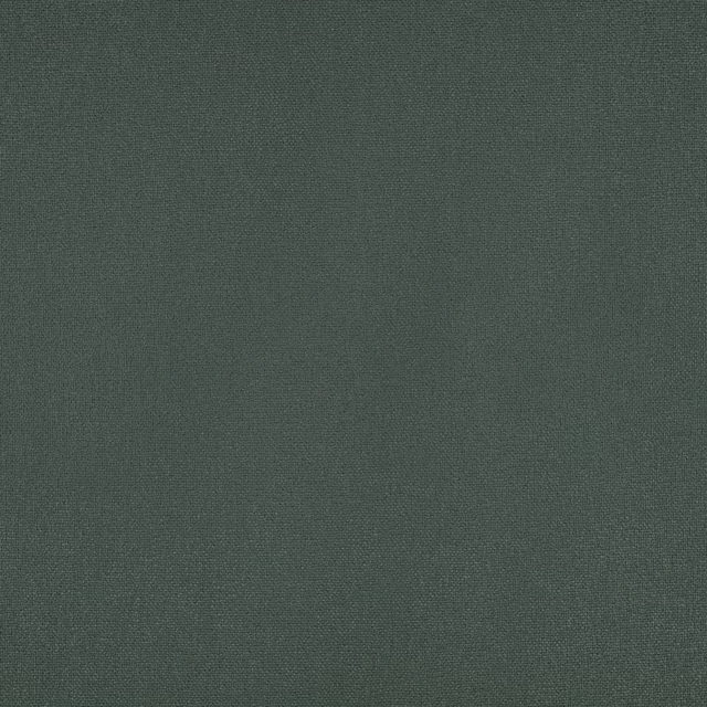 Close view of Elio Ivy’s dense, dark ivy-green plain weave