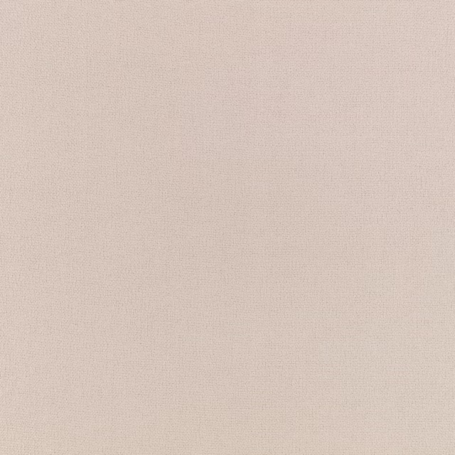 Pale warm greige Elio fabric showing a fine, even plain weave