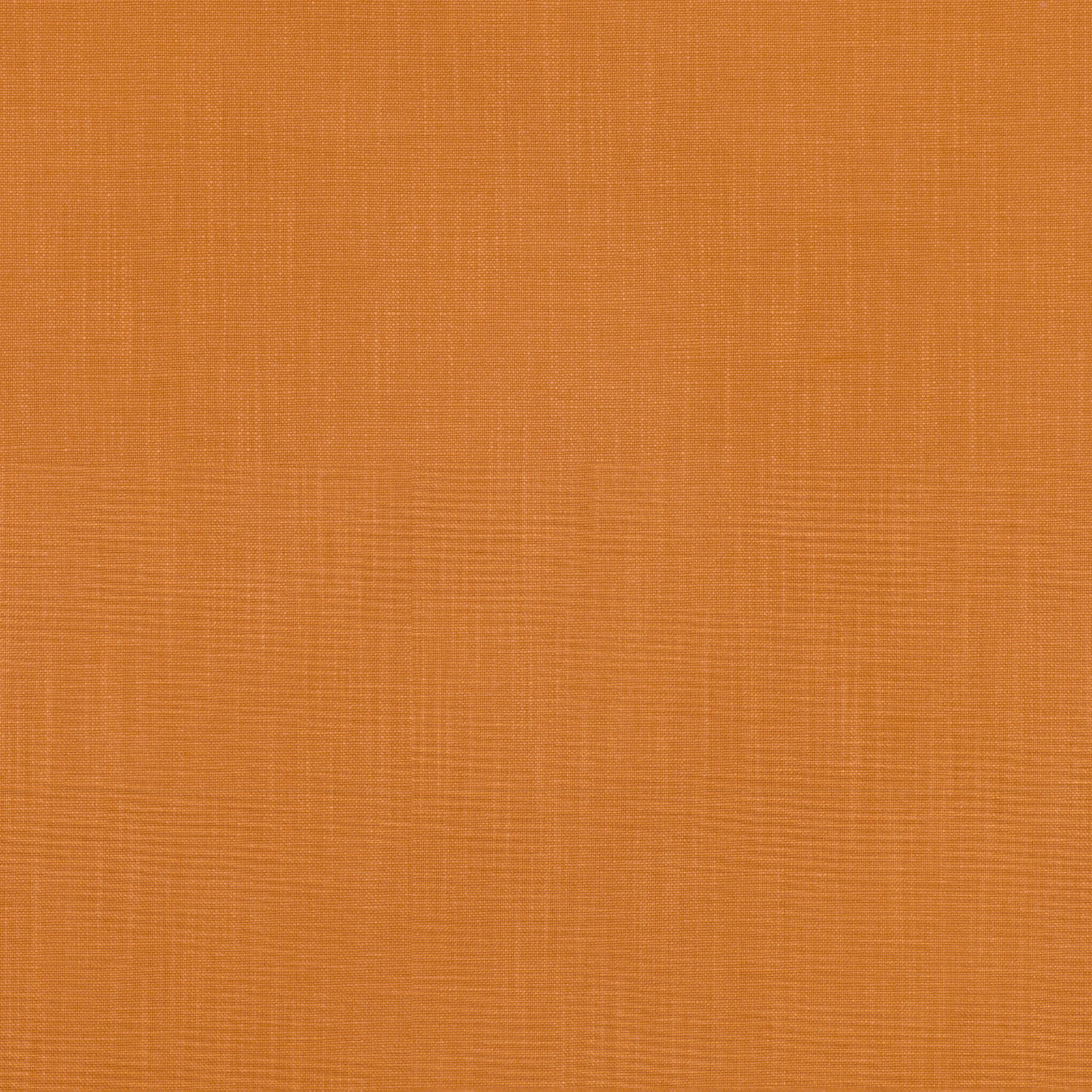 Close-up of warm cinnabar-orange fabric with a fine crosshatched woven texture