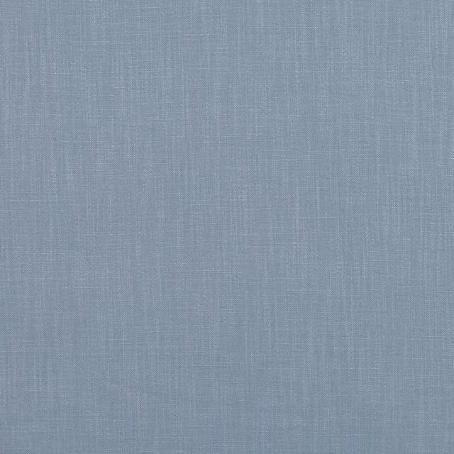 Muted cornflower blue fabric with fine crosshatch weave and softly grainy texture