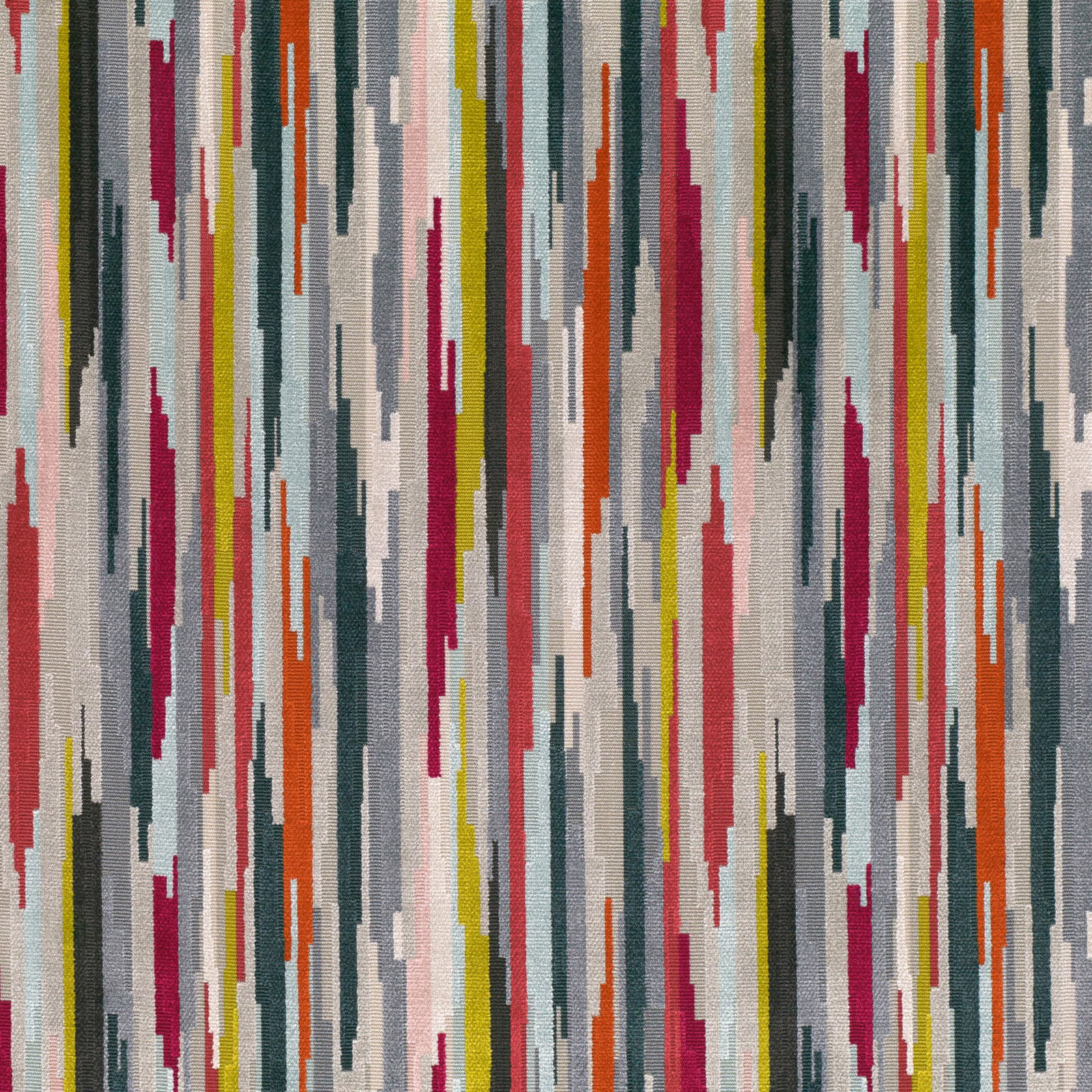 Multicoloured woven fabric with jagged vertical bands in teal, red, orange and olive