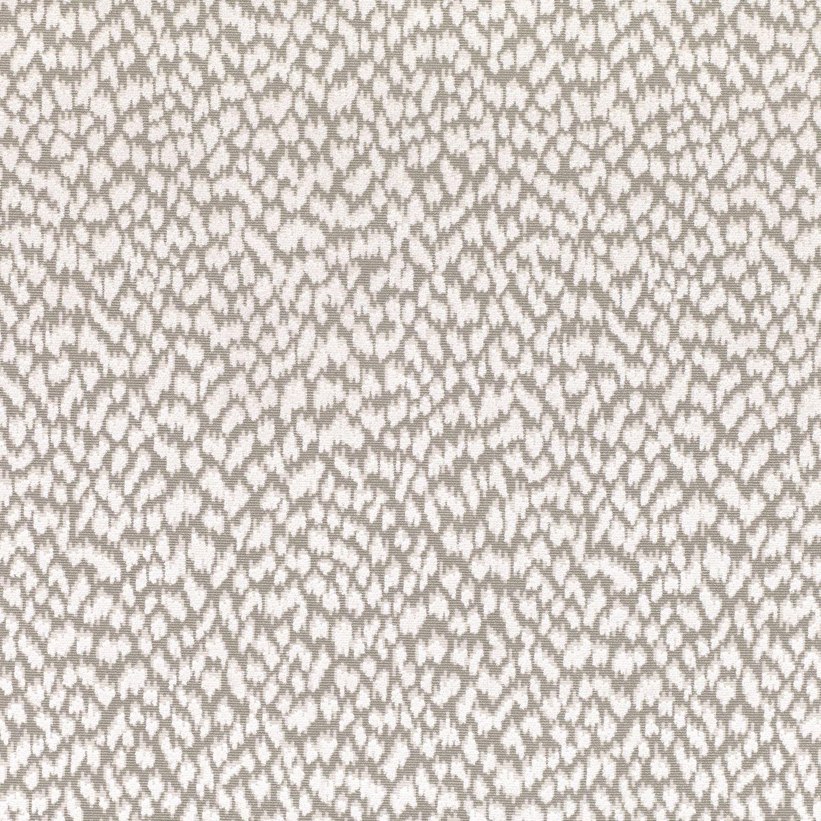 Cream and taupe woven fabric with a small irregular organic motif