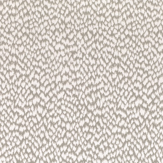 Cream and taupe woven fabric with a small irregular organic motif