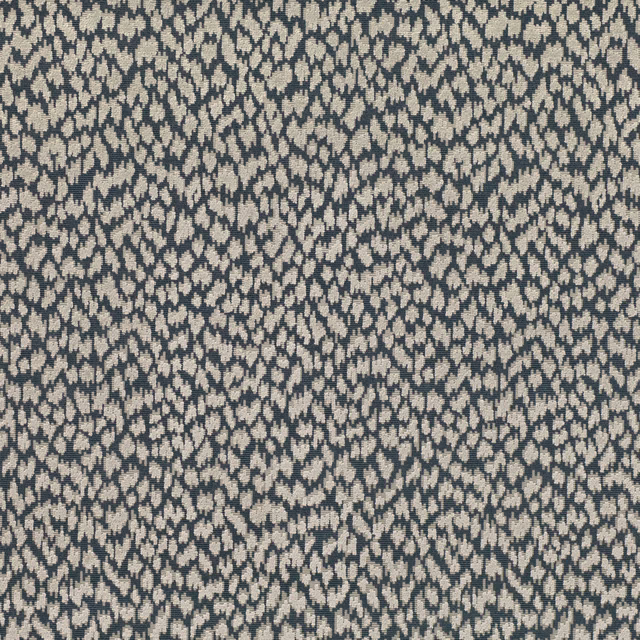 Dense taupe textile with pale irregular leaf-like flecks in a dark woven ground