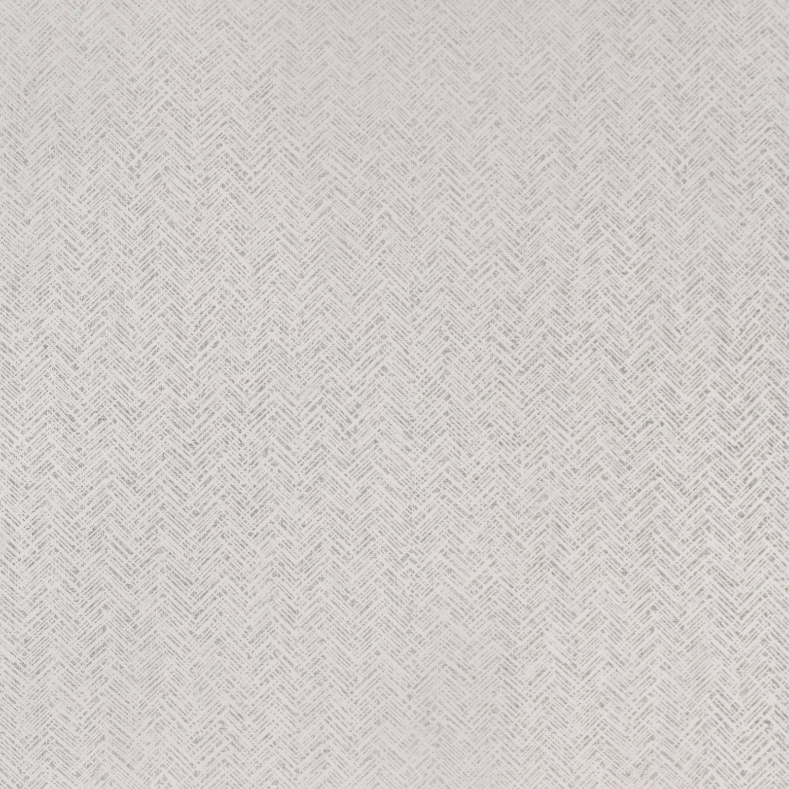Pale grey wallpaper with a fine repeating diagonal herringbone texture