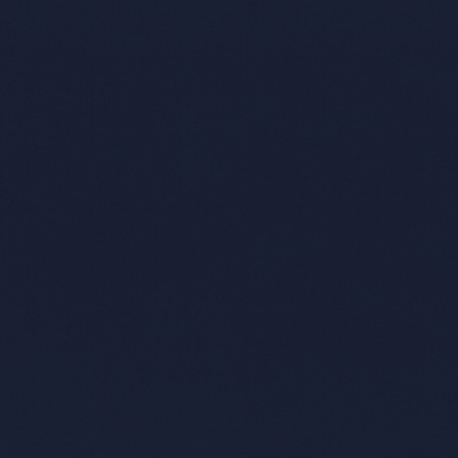 Close-up of Forenza Navy, an ink-dark blue plain weave with subtle tonal texture