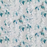 Pale grey floral fabric with teal leaves and white blossom sprays