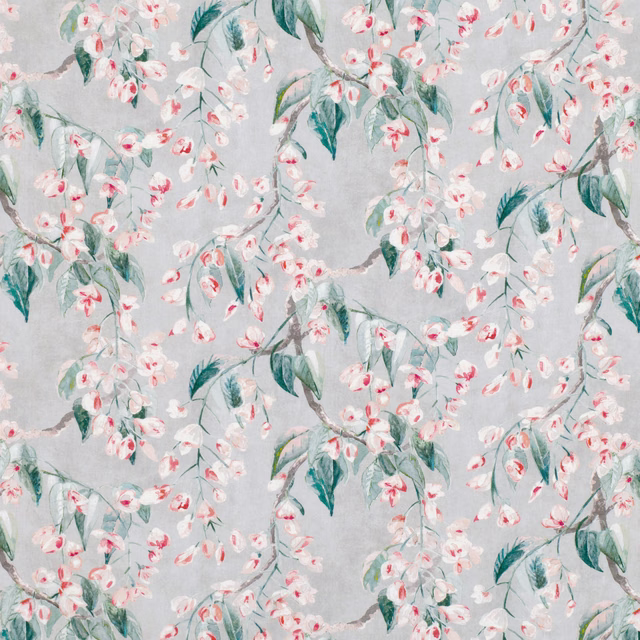 Blue-grey floral fabric with blush blossoms, teal leaves and trailing branches