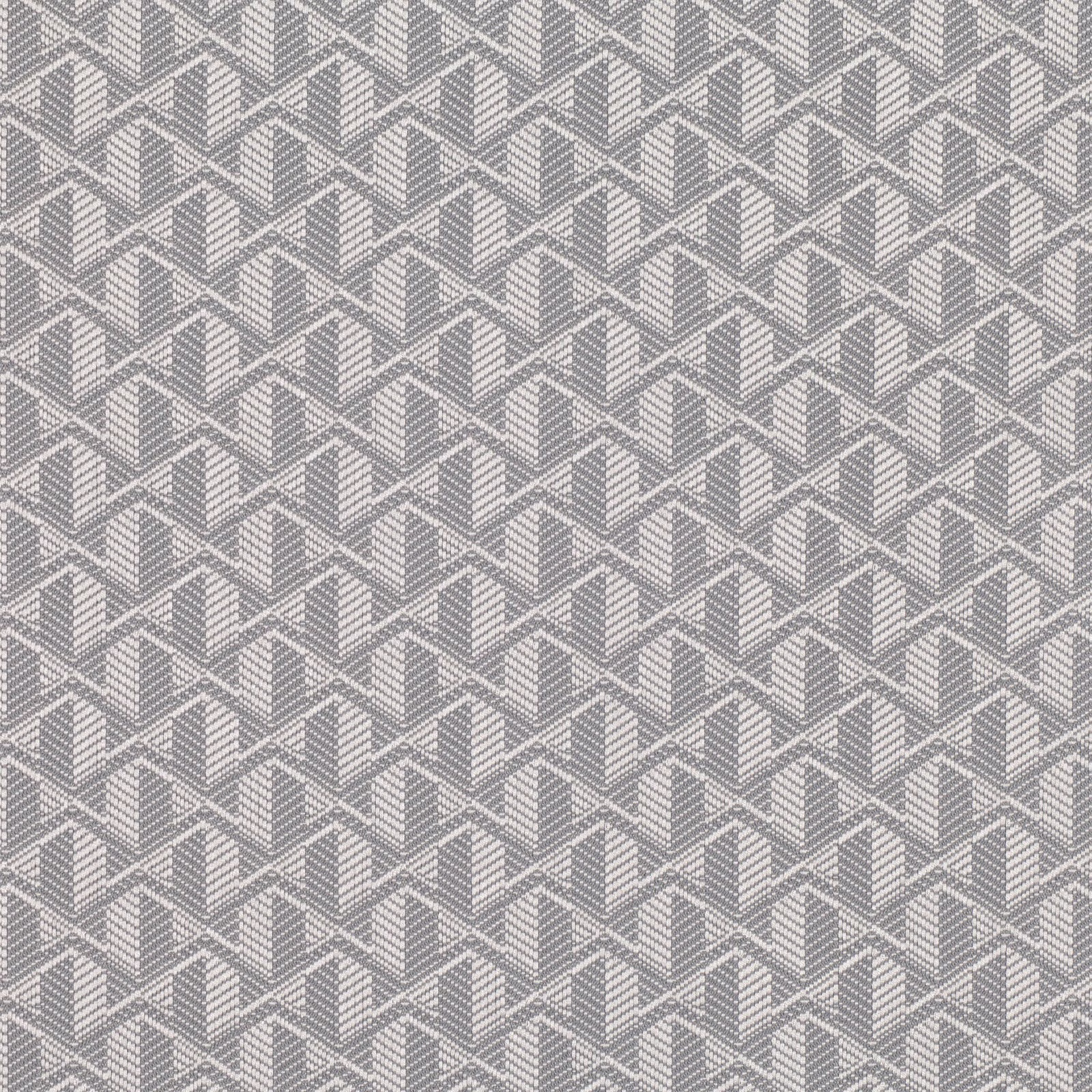 Cool stone-grey woven fabric with repeating pale-edged geometric chevrons