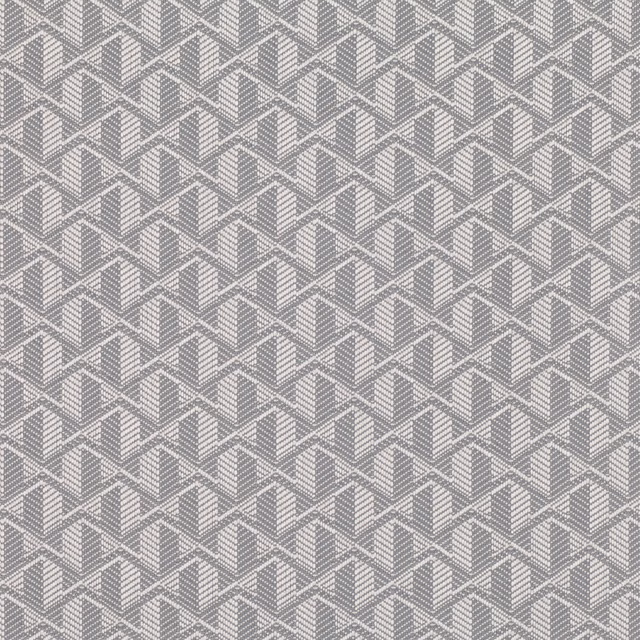 Cool stone-grey woven fabric with repeating pale-edged geometric chevrons