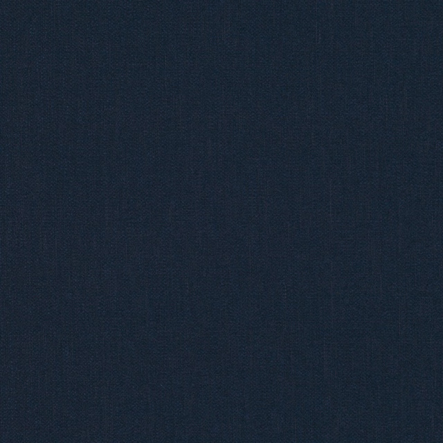 Close-up of deep indigo blue fabric with subtle fine woven texture