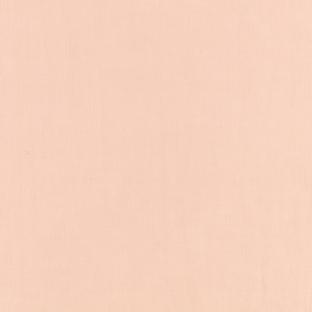 Soft blush-pink fabric with a barely visible, fine woven surface