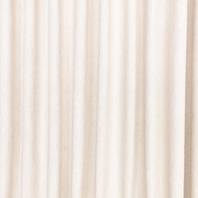 Pale sandstone beige fabric with softly irregular vertical striations in hanging folds
