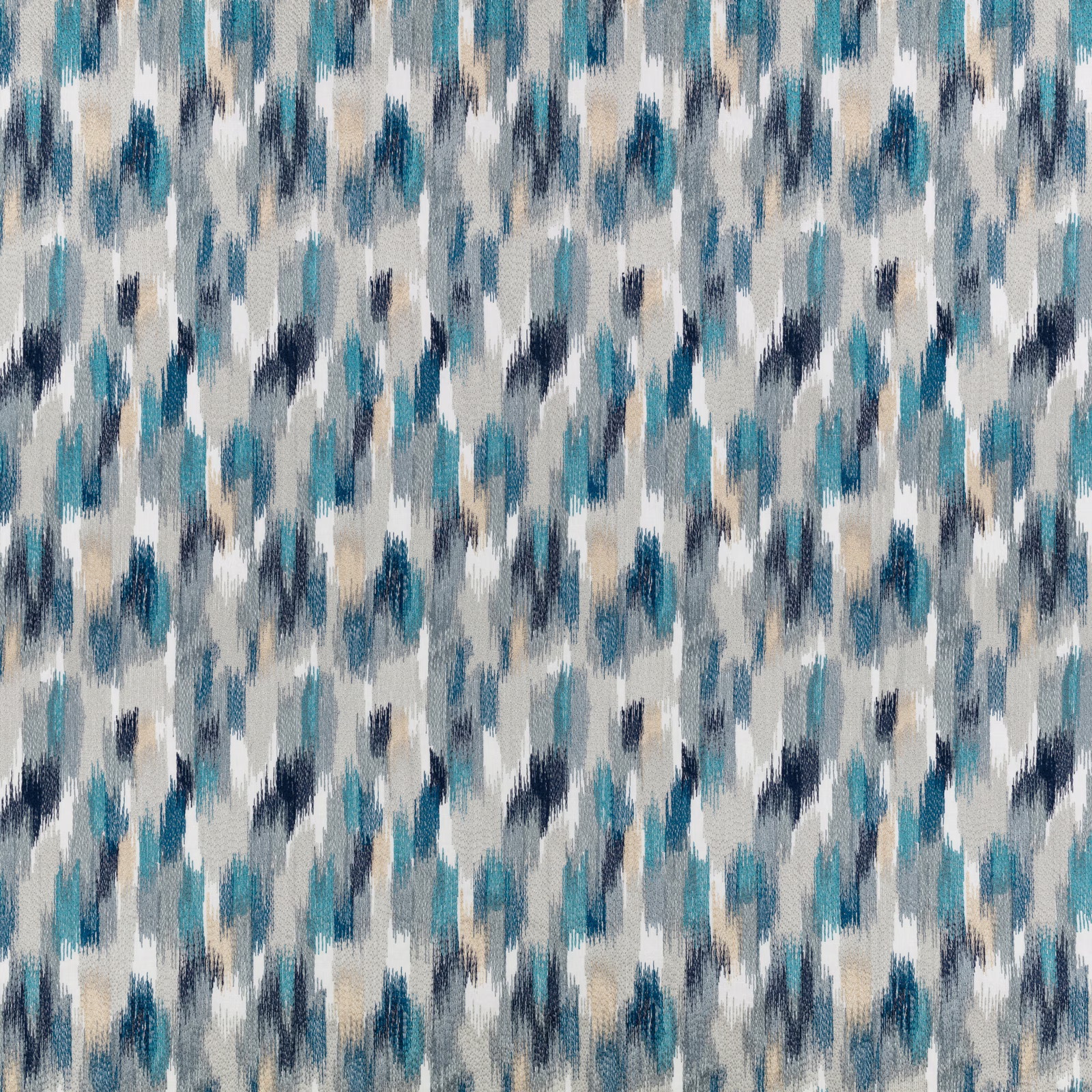 Moroccan blue woven textile with vertical teal, cream and navy ikat marks