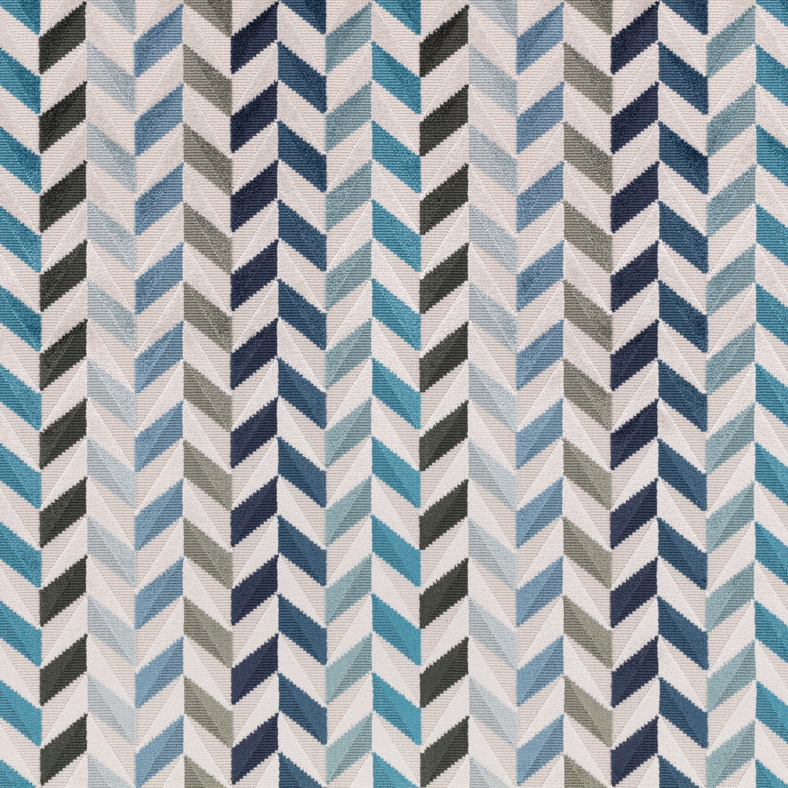 Textured woven fabric with navy, teal, pale blue and grey vertical chevrons