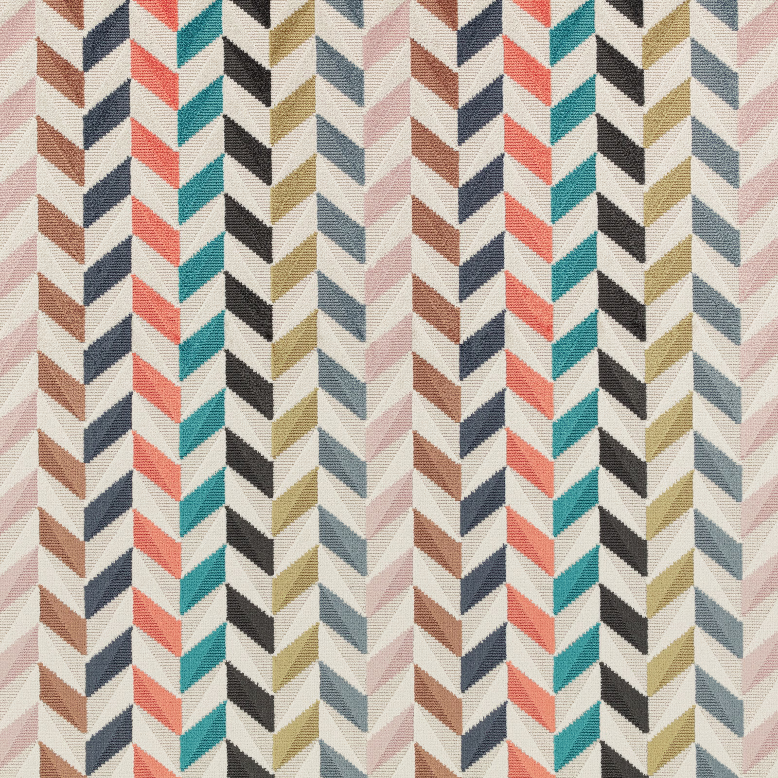 Coral, teal, navy and olive chevrons woven across a warm ivory fabric