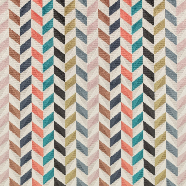 Coral, teal, navy and olive chevrons woven across a warm ivory fabric