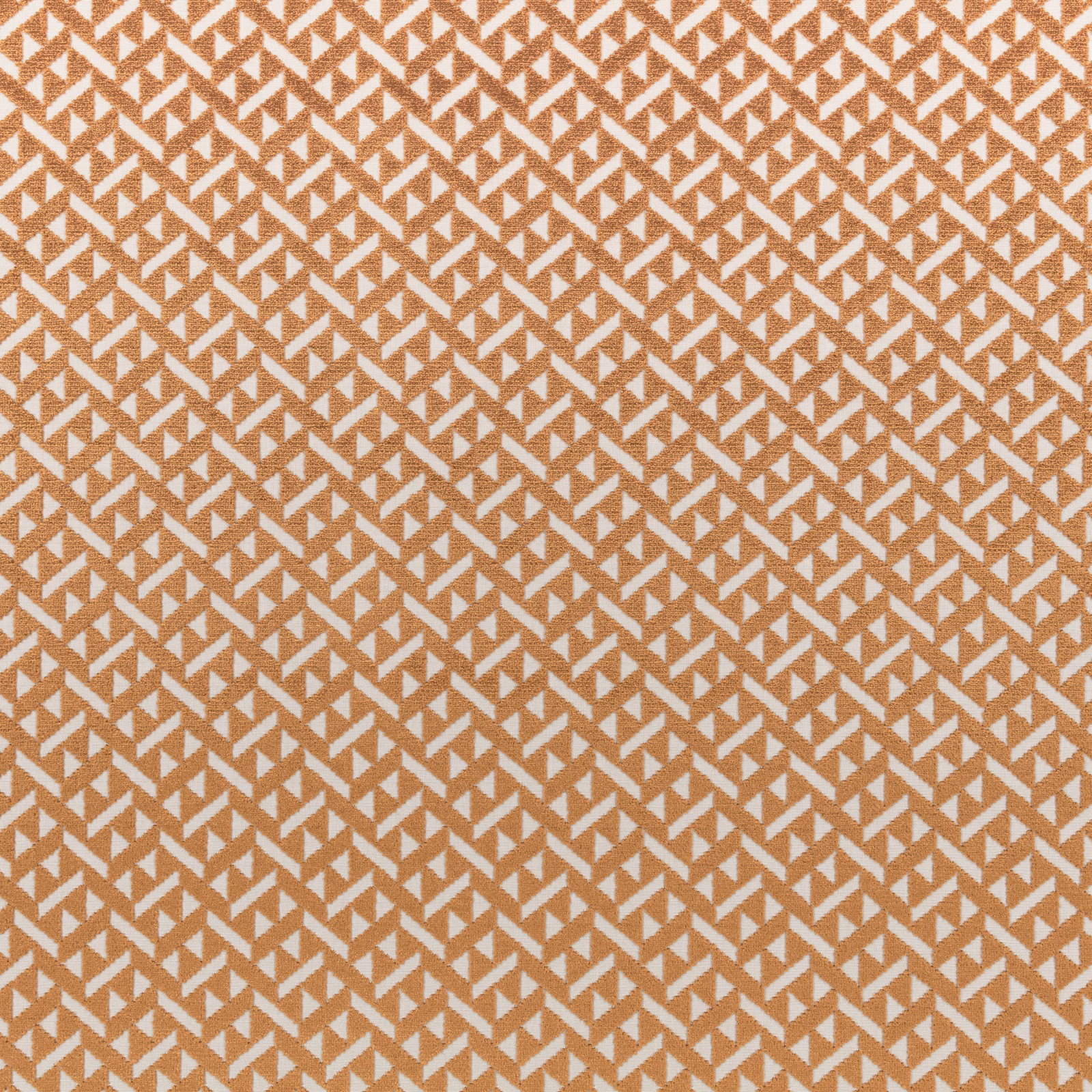 Warm copper fabric with repeating ivory angular motifs and a fine woven texture