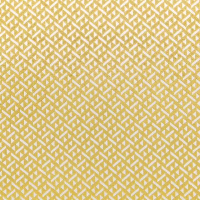 Muted olive-gold woven fabric with a small cream angular geometric pattern