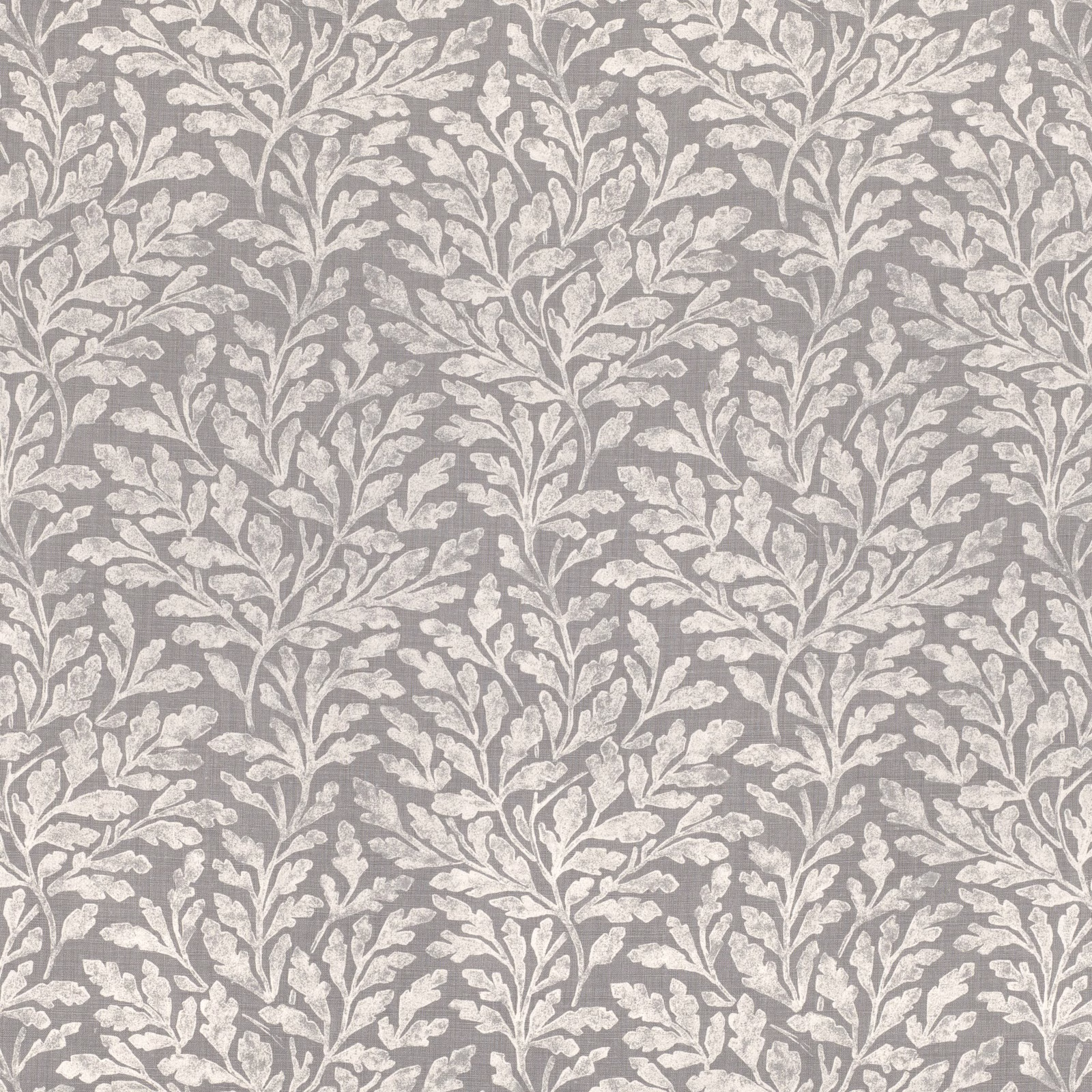 Arctic grey fabric with pale ivory leafy branches in a textured botanical repeat