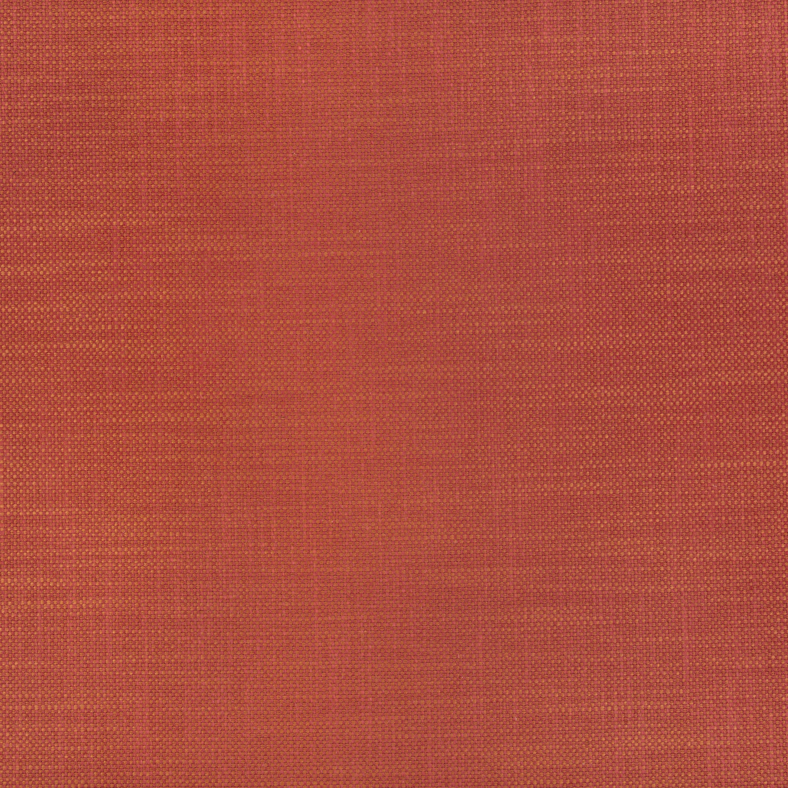 Close-up of warm burnt sienna fabric with fine irregular crosshatch weave