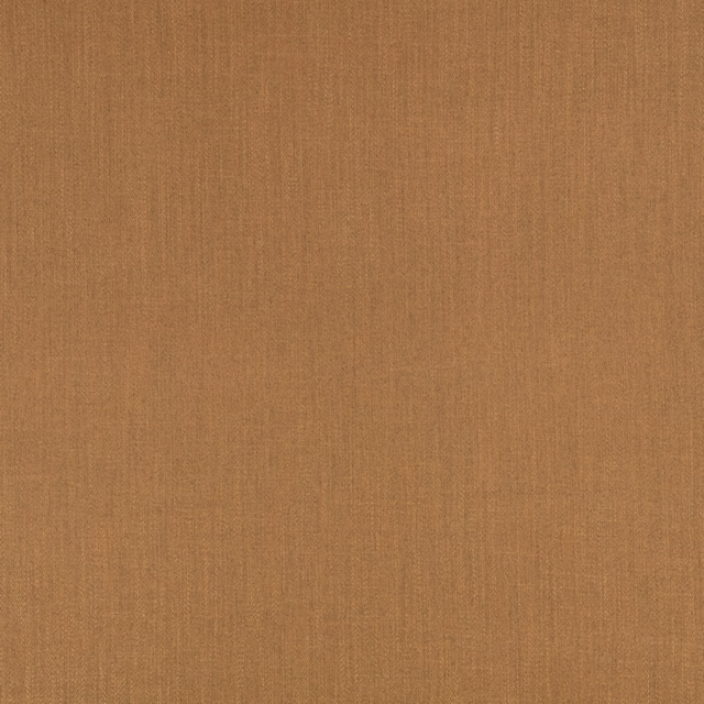 Warm ginger-brown woven fabric with subtle vertical slub texture