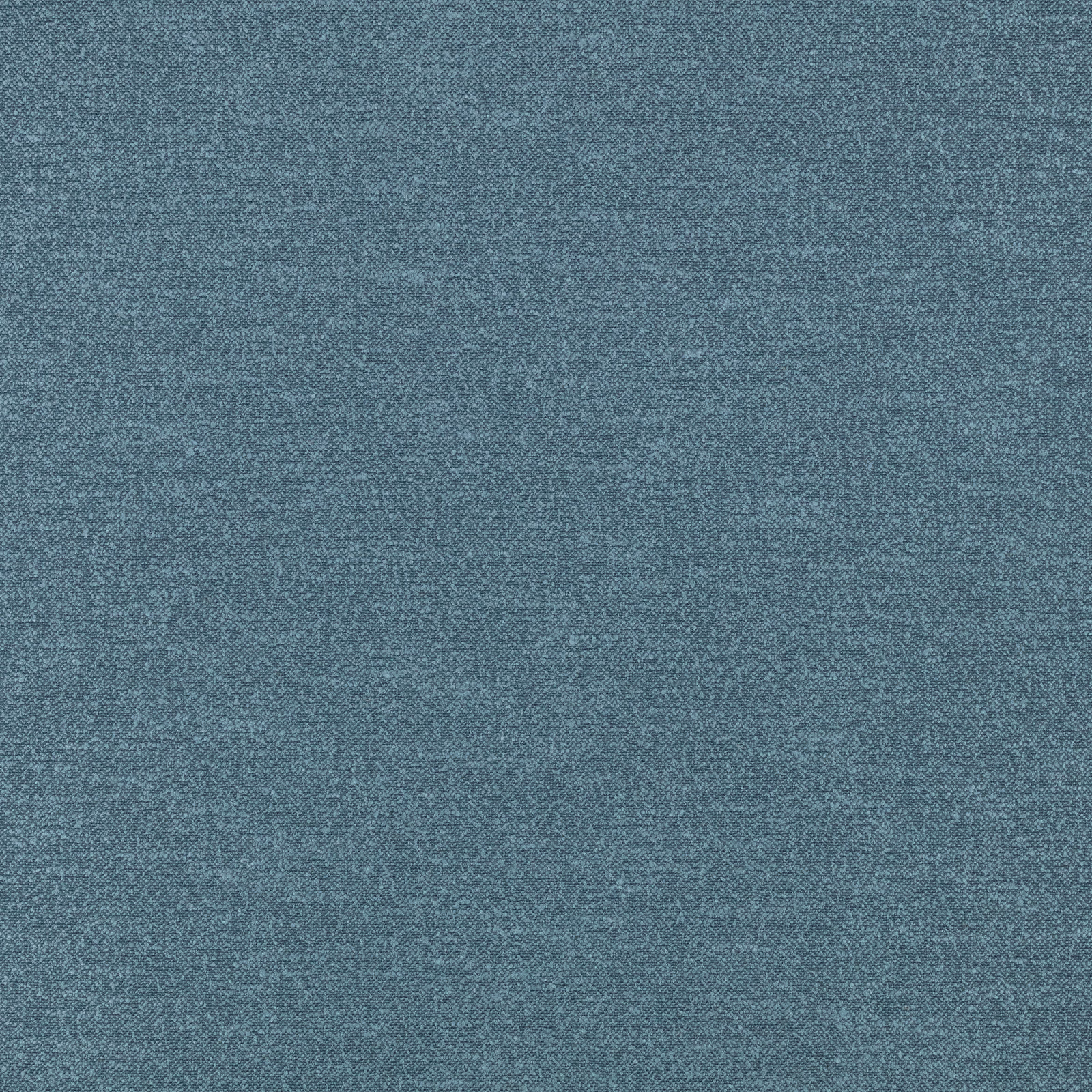 Close-up of muted blue-grey woven fabric with fine mottled texture