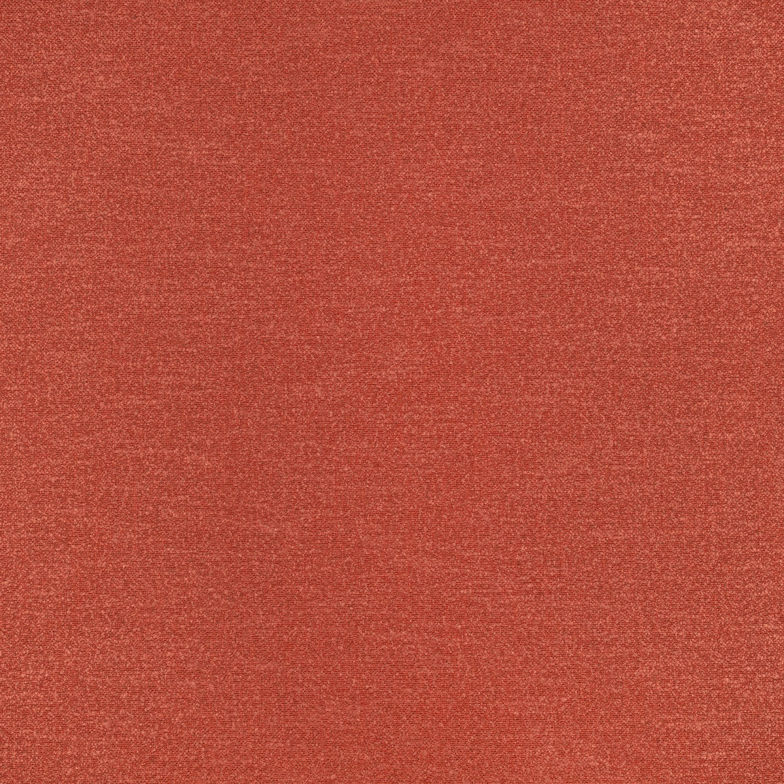 Close-up of muted terracotta plain weave with fine mottled red-orange texture
