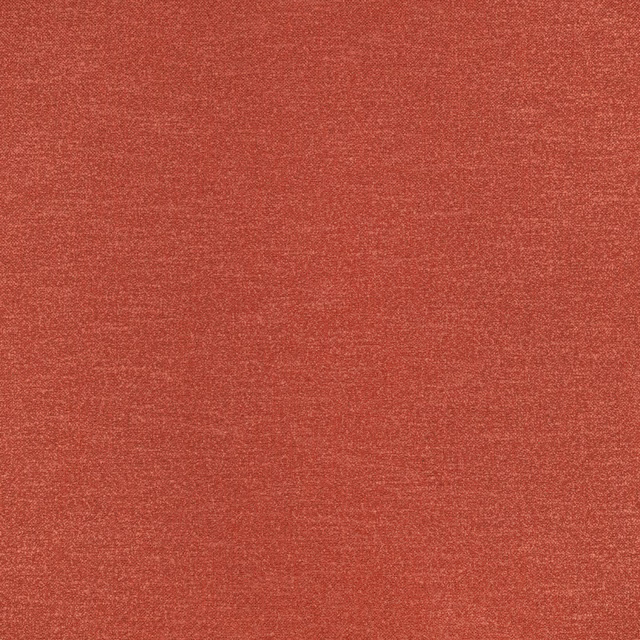 Close-up of muted terracotta plain weave with fine mottled red-orange texture