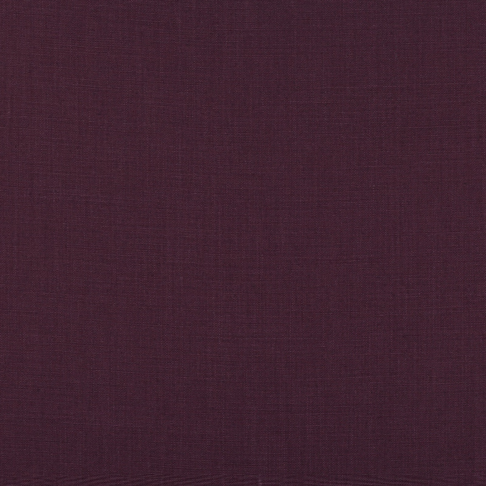 Close-up of deep cassis plum fabric showing a fine crosshatched woven texture