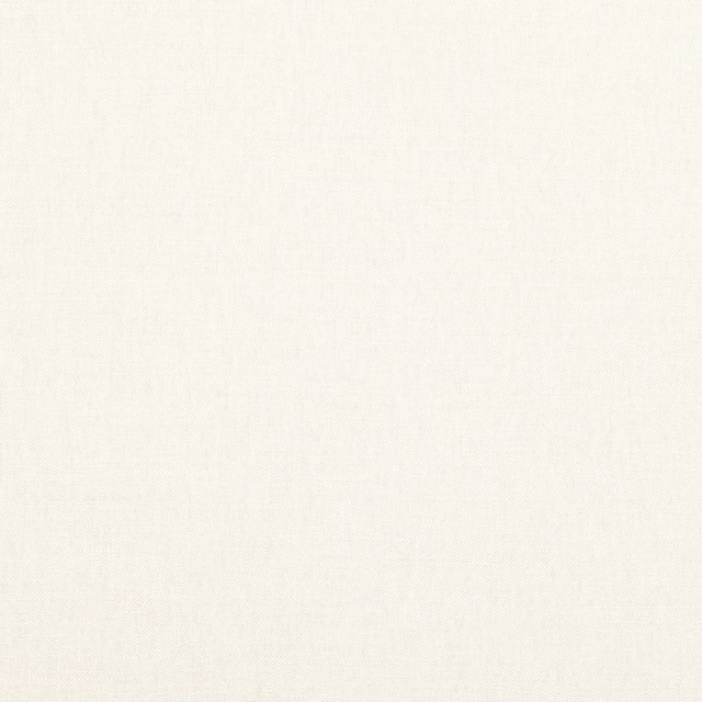 Close-up of pale warm cream fabric with a fine, even woven texture