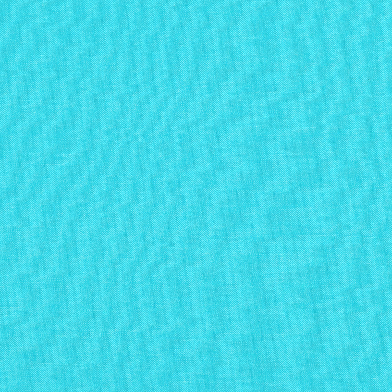 Close-up of bright turquoise Bermuda fabric with a fine, even woven texture