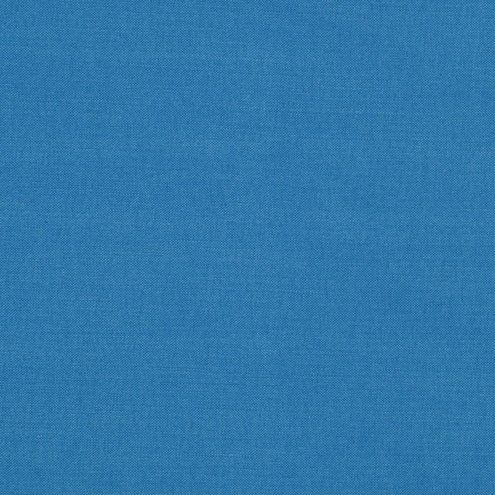 Saturated cobalt-blue plain weave with fine crosshatched texture in close-up