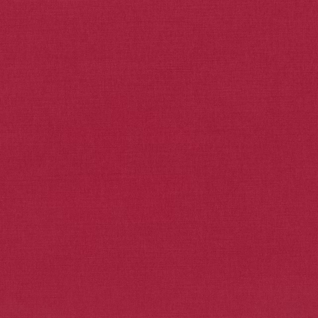 Deep cranberry red fabric with a fine, even woven texture and softly varied surface