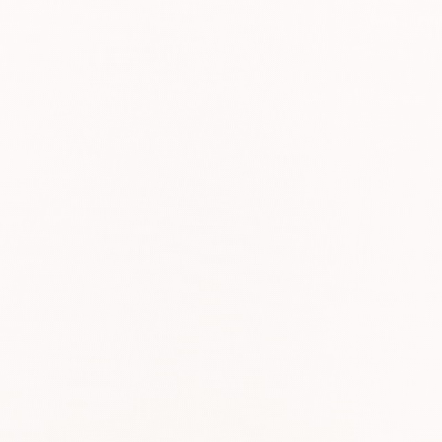 Romo Linara Egret fabric in a softly textured warm ivory plain weave