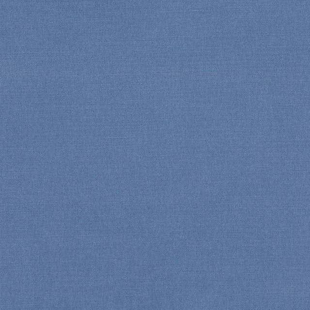 Muted blue fabric with fine, even weave and subtle tonal variation