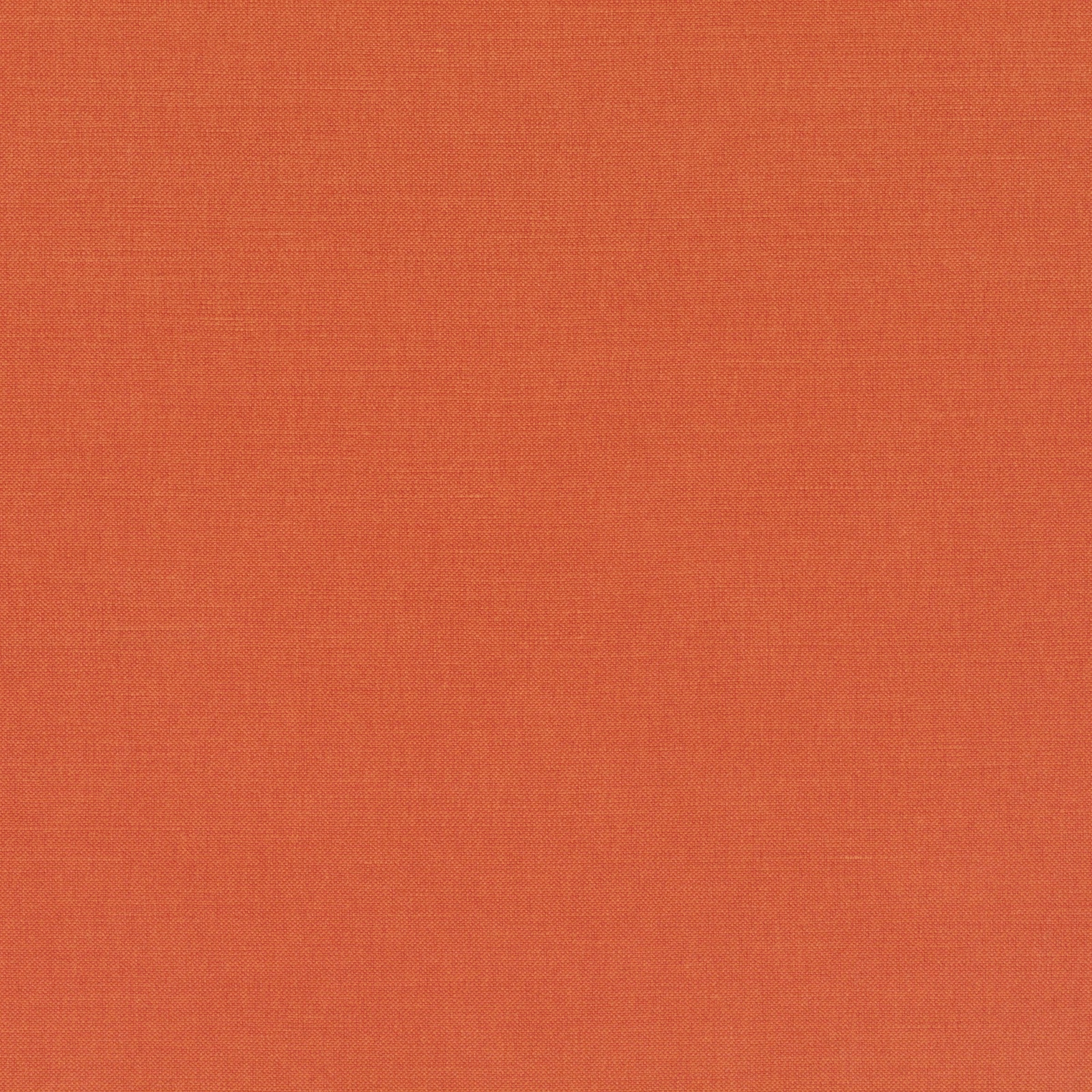 Close view of warm henna terracotta cloth with a fine, even plain weave