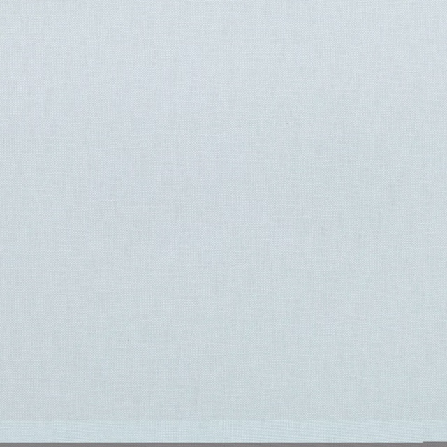 Close-up of pale icy blue-grey fabric with a fine, even woven texture