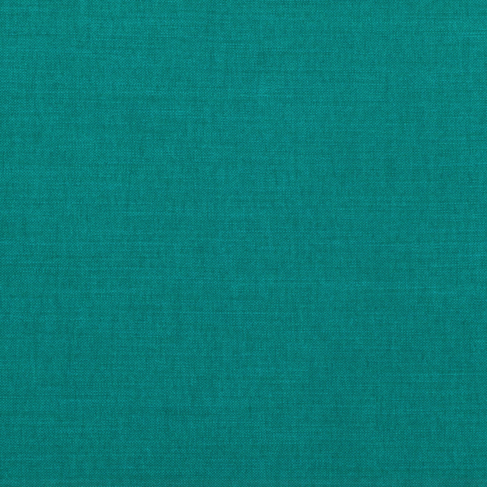 Close view of deep teal-green plain weave with subtle slub and tonal variation