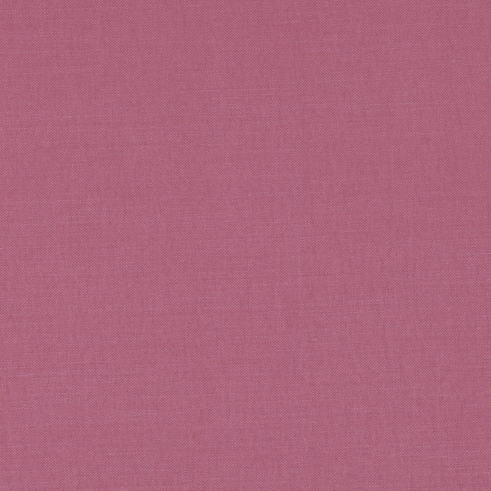 Muted dusty rose-pink plain weave fabric with a fine, even woven texture