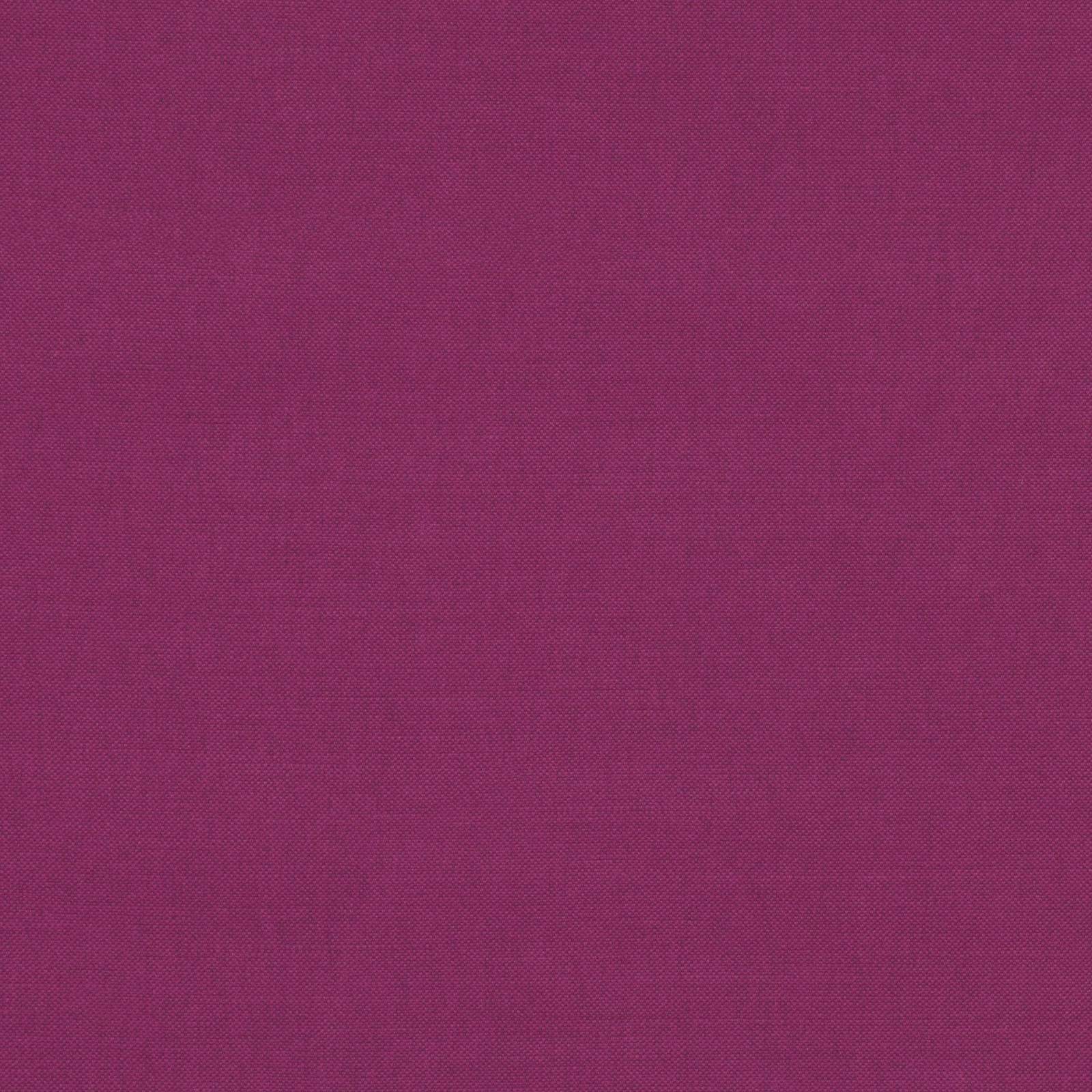 Close-up of deep berry-magenta Linara fabric with a fine, even woven texture