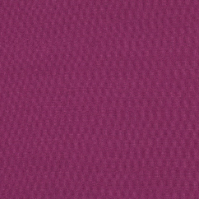 Close-up of deep berry-magenta Linara fabric with a fine, even woven texture