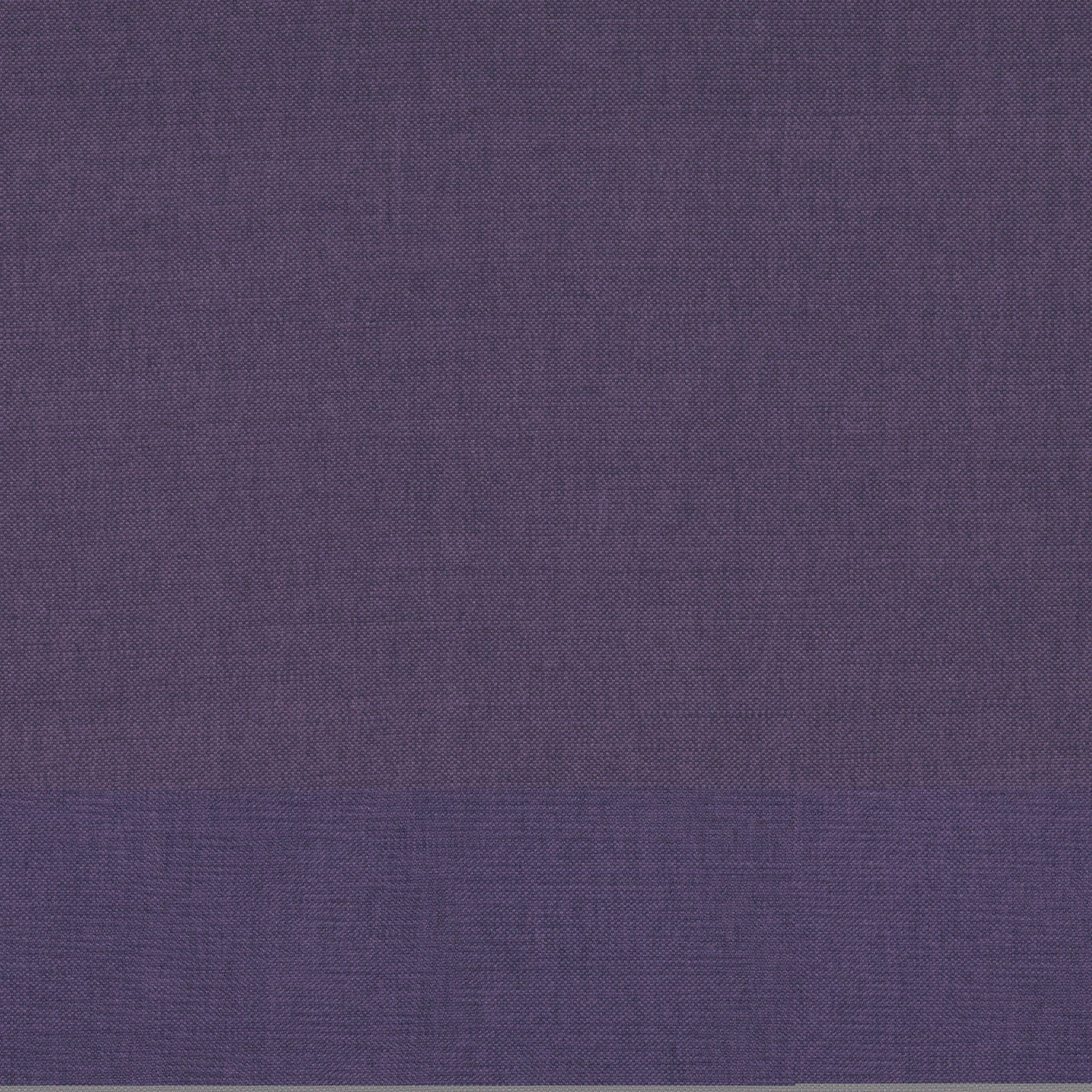 Close-up of muted prune-purple plain weave with fine crosshatched texture